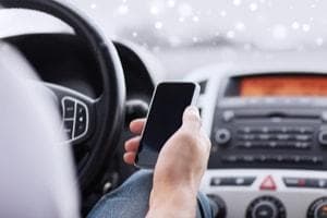 Car accident, driver safety, Lake County personal injury attorney, smartphone world, distracted driving